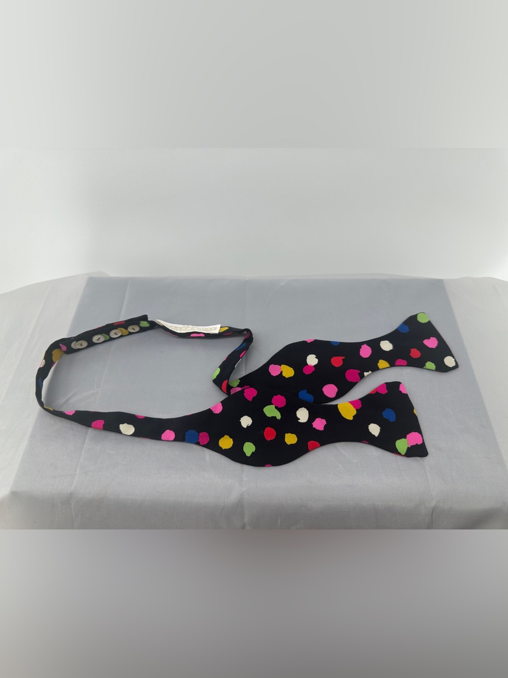 Carrot & Gibbe black rainbow polka dotted bow tie